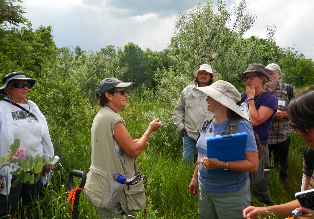 Ecologist Denise Culver in the field with workshop participants.